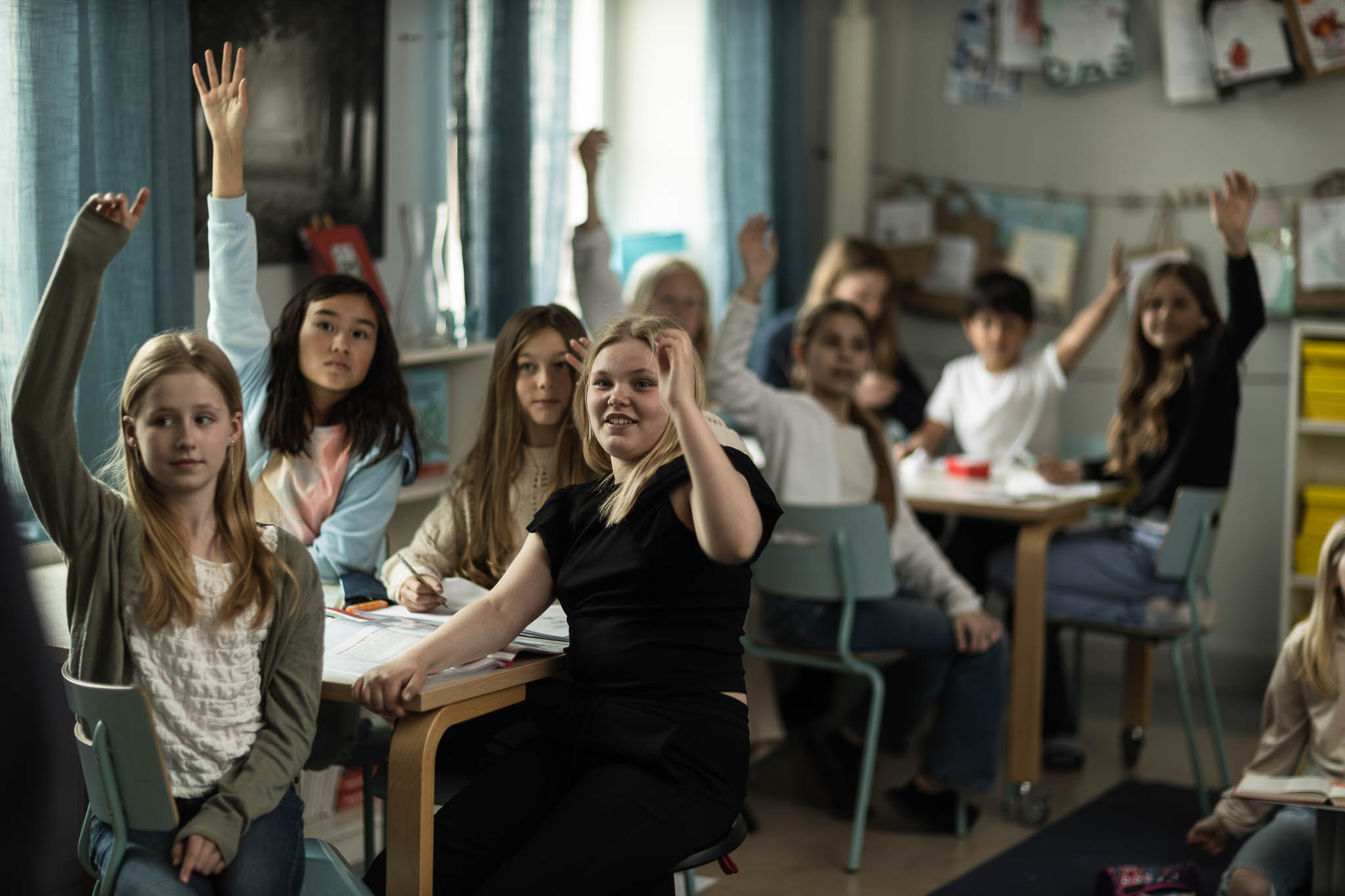En klass som räcker upp handen
